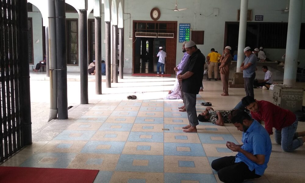 Worshippers praying inside a mosque
