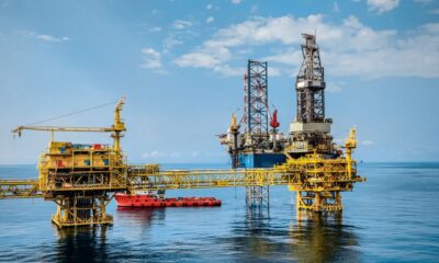 Offshore oil production platform and drilling rig on open water