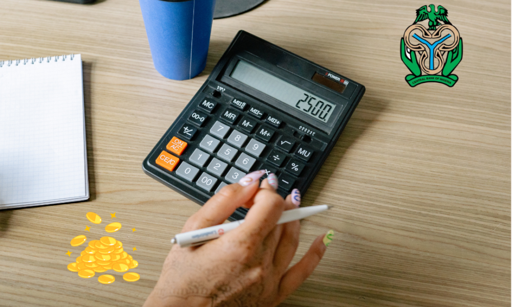 A table with a hand calculator and a CBN logo embedded