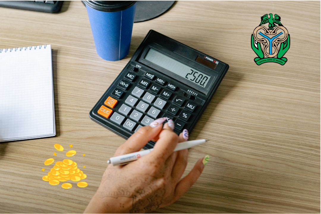 A table with a hand calculator and a CBN logo embedded