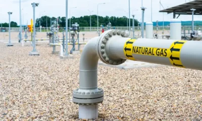 A gas pipe with label "Natural Gas" running across the ground