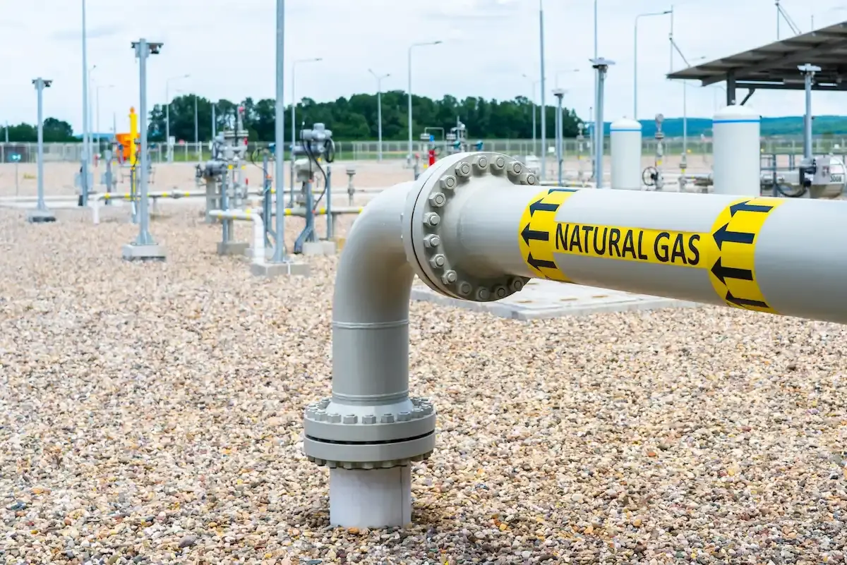 A gas pipe with label "Natural Gas" running across the ground