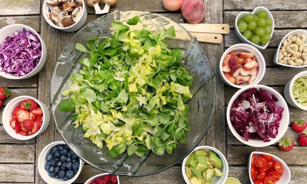 Overhead view of a healthy vegetable and salad spread