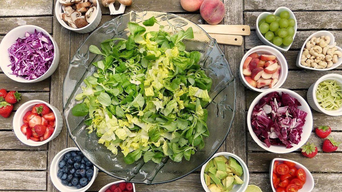 Overhead view of a healthy vegetable and salad spread