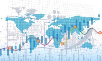 World map overlaid with financial market charts illustrating sovereign debt