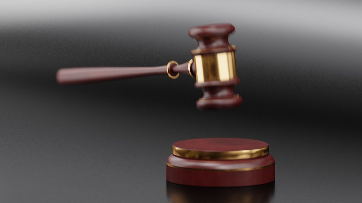 Judge's gavel on a dark background